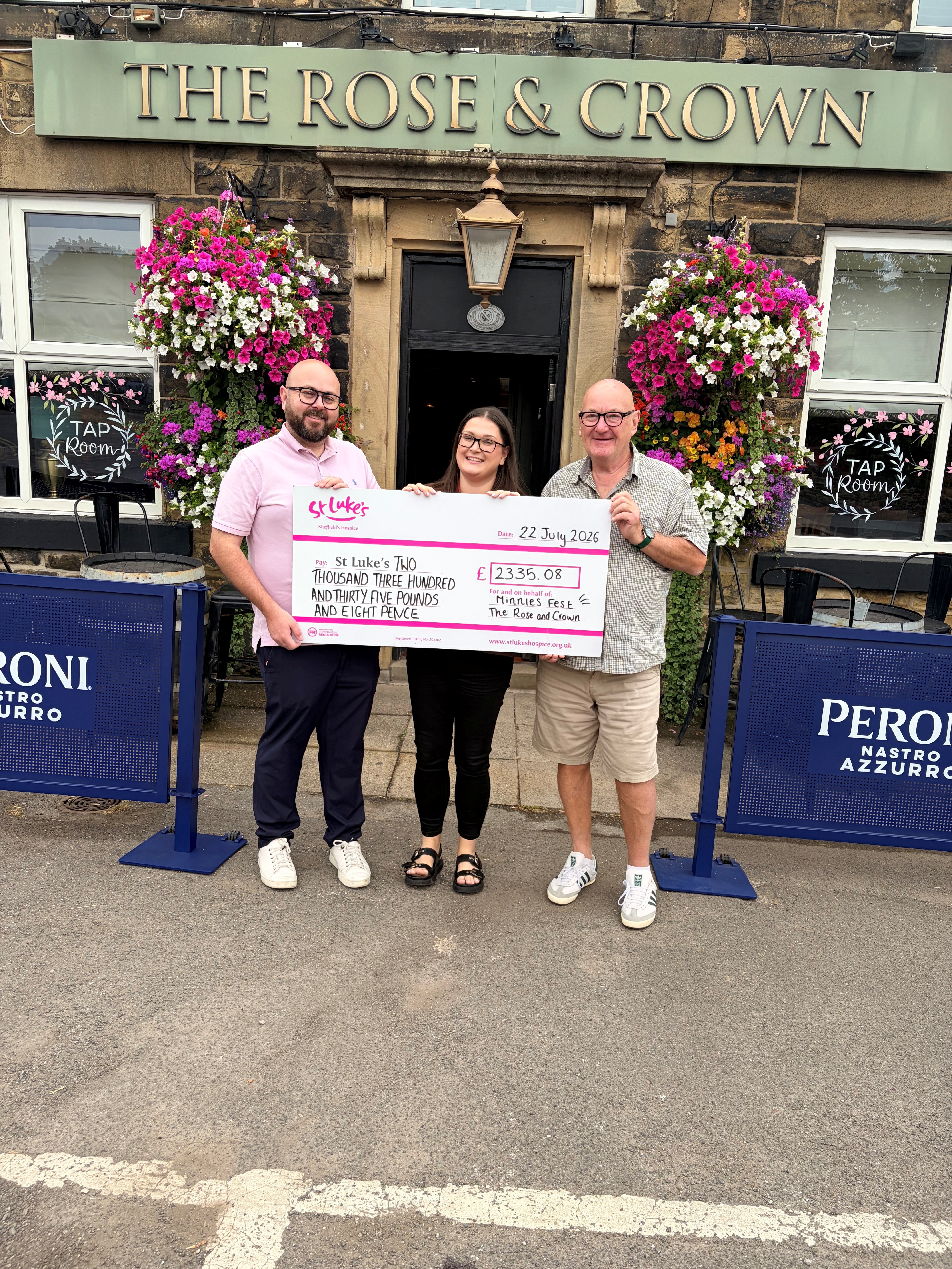 Pub Landlord, Tom Mosley, and his dad, Mick, with St Luke's Community Fundraiser, Olivia Yates.